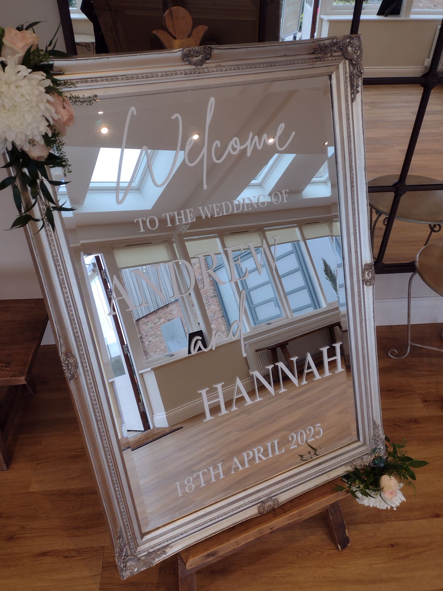 Sign saying "welcome to our wedding"